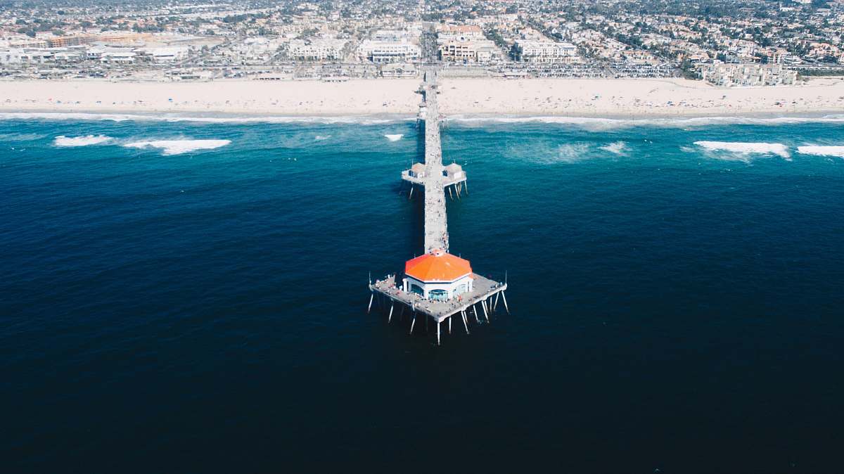 huntington beach dome on a wooden dock blue